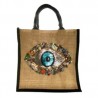 Bolsa cuadrada de yute con parche de ojo bordada a mano con dijes