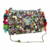 Bolsa tejida y bordada a mano con dijes y flecos