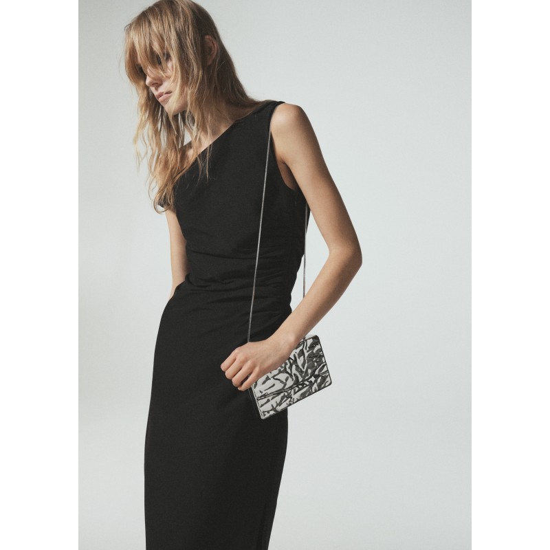 Bolso clutch textura