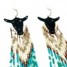 Aretes de chaquira con toro