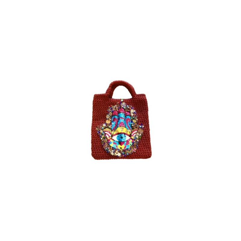 Bolsa tejida y bordada a mano con dijes y parche de Hamsa