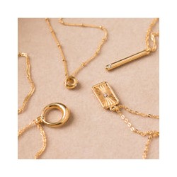 Dije plaquita con zirconia