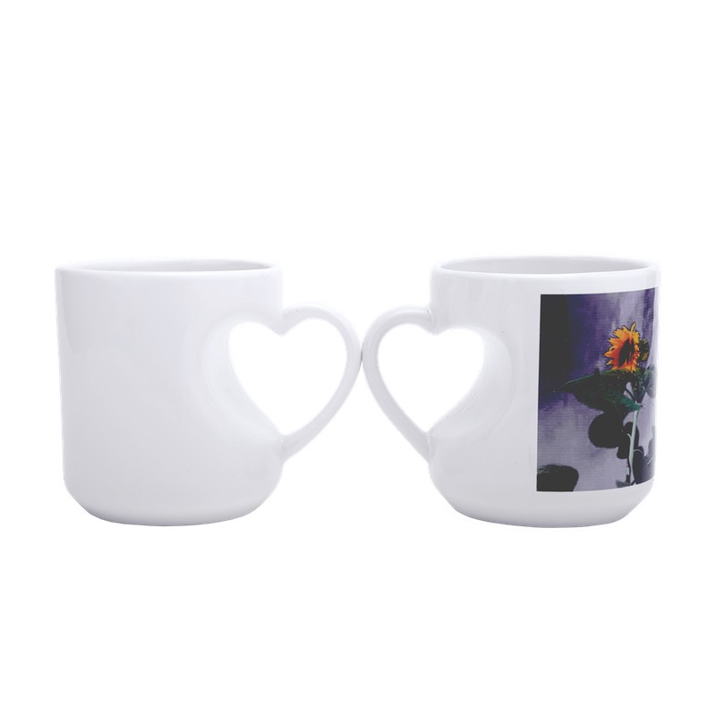 TAZA CAIRO CON ASA DE CORAZON DE CERAMICA CON SUB...