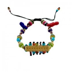 Pulsera con chaquira, cristal, ojos y dije ajustable