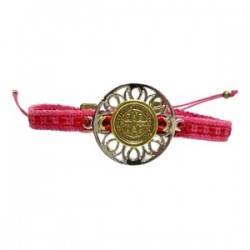 Pulsera con dije San Benito ajustable sobre cinta bordada oaxaqueña